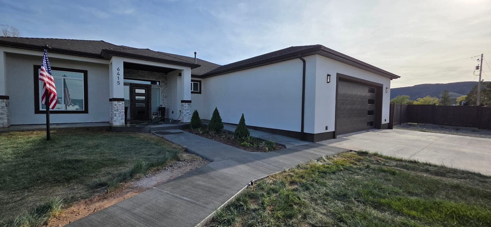 Covered patio & entry step — new pour by Montara Forge