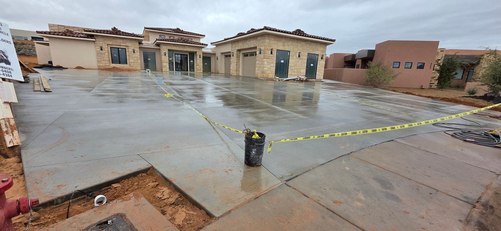 Custom-home driveway — fresh pour by Montara Forge